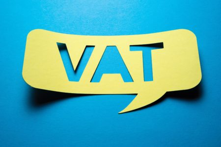 VAT letters in a yellow speech bubble