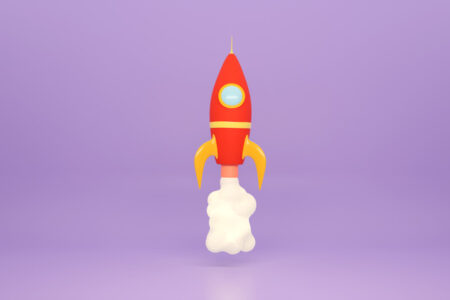 End of tax year guide - purple background with red rocket in the centre