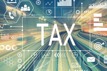 Tax Facts 2024/25 - road with tax written over